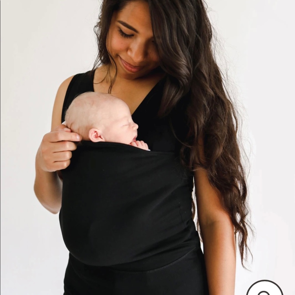 Lightly worn Lalabu soothe baby wearing shirt